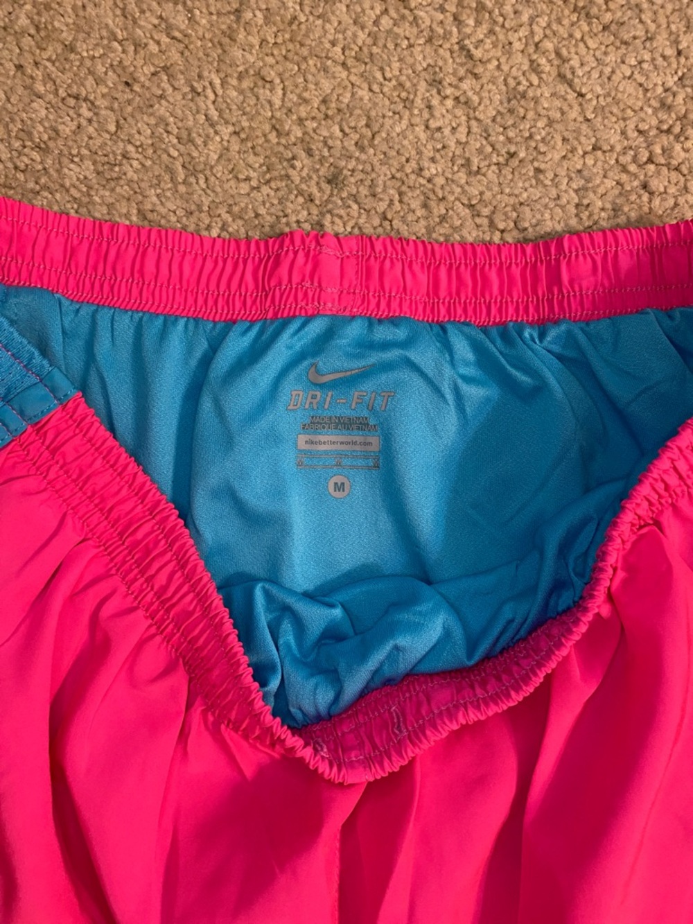 Nike Women's Hot Pink Athletic Shorts with Blue Trim - Picture 2 of 4